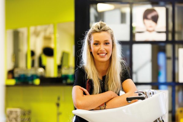 Cornwall College hairdressing student in college training salon